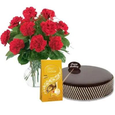 Mud Cake With Red Carnations And Lindt Chocolates