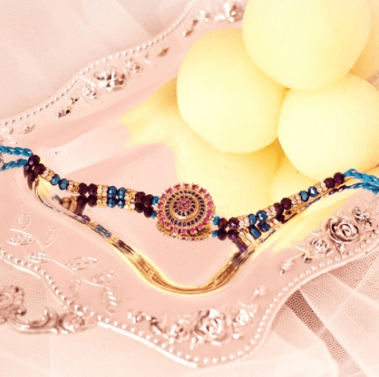 Delightful Rakhi with Rasgulla Fusion