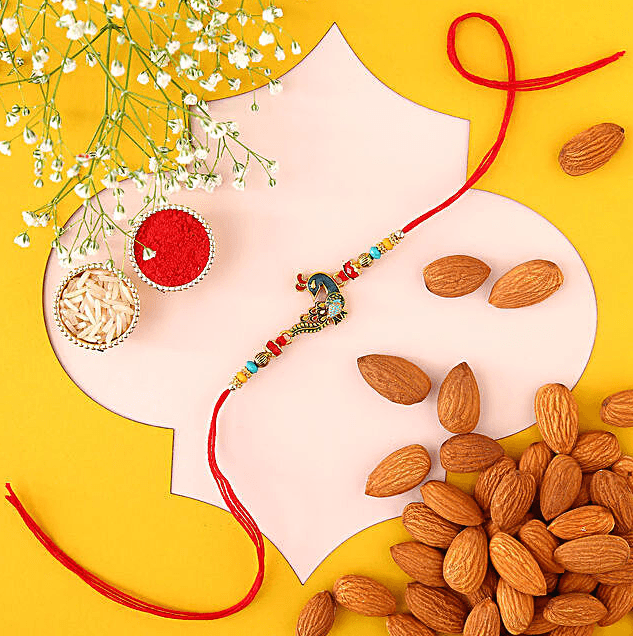 Artful Peacock Rakhi and Healthy Sneh Delights