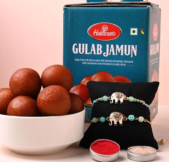 Artistic Elephant Rakhi Pair with Delectable Gulab Jamun