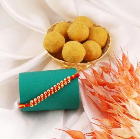 Rakhi Mauli Bond with Heavenly Laddoo