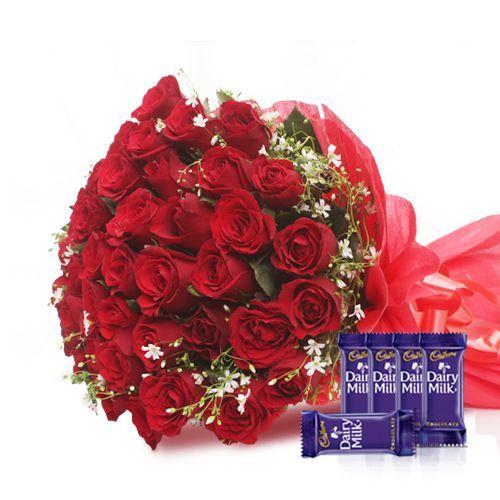 A classic Rose Collection - In Tissue Wrap with Dairy Milk Chocolates Combo